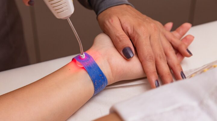 treatment-using-ilib-wrist-brace-rhema-gold-physiotherapy-calgary-ab